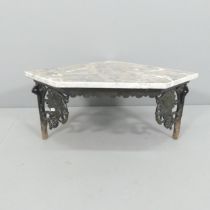 A marble-topped wrought iron corner hanging shelf. 69x34x52cm.