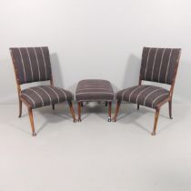 A pair of mid-century Italian lounge chairs and a matching footstool in the manner of Carlo di