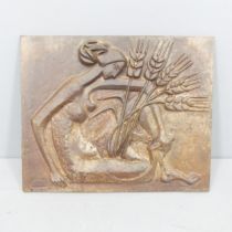 A mid-century French cast iron panel depicting a female figure with wheat, signed lower right for M.