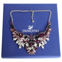 SWAROVSKI - a palladium plated impulse necklace, set with 3-colour crystals, boxed
