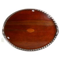 A large oak serving tray, with silver plate and copper gallery surround, 46cm x 59cm