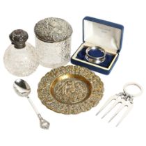 A silver-topped jar, scent bottle, cased silver napkin ring, spoon etc