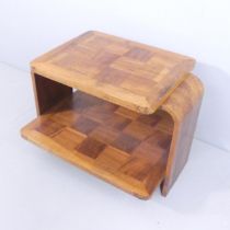 A 1930s two-tier Art Deco coffee table with geometric parquetry surfaces. 76x54x58.5cm.