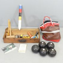 Five varous lawn bowls, and a part Jaques Eclipse croquet set.