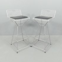 A pair of post-modern wire mesh barstools by Meshman.