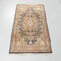 A blue-ground Persian rug. 158x93cm.