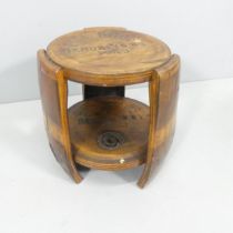 A vintage oak two-tier barrel seat, inscribed "Piel Bros, Brooklyn, N.Y, 1940. 35x38cm.