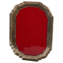 A silver-fronted photo frame, with velvet-covered back and strut, H18cm (marks rubbed)