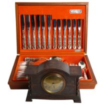 A Oneida silver plate canteen of cutlery, in wooden display case, and an oak 8-day movement Mappin &