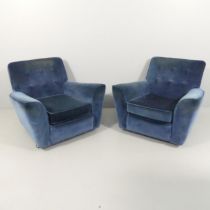 A pair of contemporary buttonback upholstered armchairs in the mid-century manner. Overall