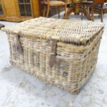 A large wicker laundry hamper. 75x40x52cm.