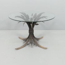 A Hollywood Regency style mid-century circular-topped side table, with wheatsheaf design base.