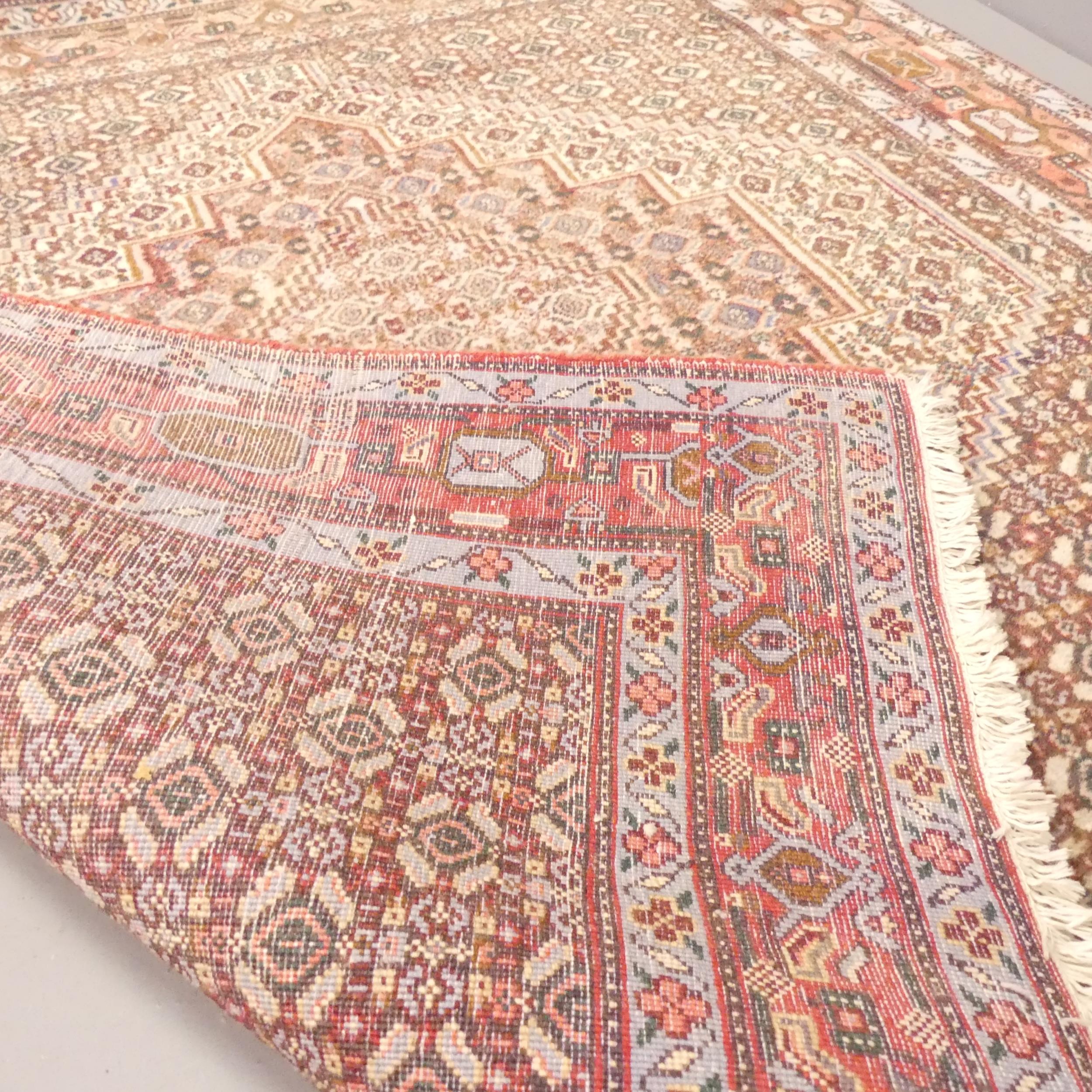 A red-ground Gazak rug. 141x129cm. - Image 2 of 2