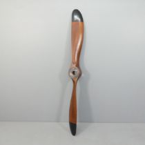 A large stained wood propeller, Length 197cm.