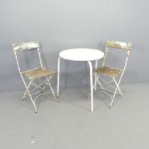 A pair of Parisienne style folding cafe chairs, and a circular garden table, 68x70cm.
