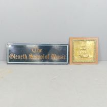 A painted wooden sign "The Gleneth School of music", 90x29, and a mounted brass panel with ship