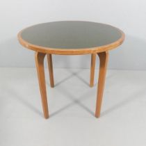 A mid-century design teak dining table with inset linoleum top. 85x75cm.