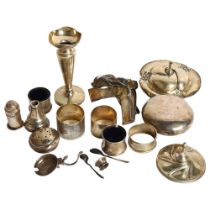 A quantity of silver items, including a snuffbox, cruet set, napkin rings, spoons etc, weighable