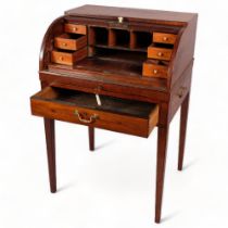 Early 19th century mahogany cylinder-front writing desk of small size, with tambour front, frieze