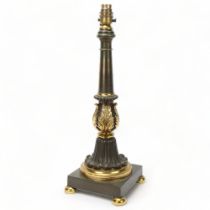 19th century parcel-gilt bronze table lamp, with acanthus leaf decoration, height excluding