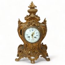 19th century French Rococo style gilded spelter-cased mantel clock, with enamel dial and 8-day