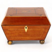 19th century mahogany sarcophagus shaped tea caddy, with shell marquetry inlay, inner lids with