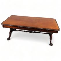 An impressive early 19th century rosewood library table, previously rosewood-veneered top has been