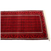 Good quality Bokhara handmade red ground rug, 213cm x 122cm Good condition