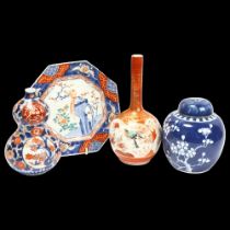 A group of Chinese and Japanese porcelain items, including a narrow-necked vase, height 23cm (4)