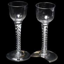 2 x 18th condition cordial glasses with opaque milk twist stems, height 15cm 1 glass has a broken