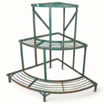 An antique cast iron 3 tier plant stand, height 74cm Paint flaking, good structural condition