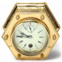 An octagonal brass-cased table clock, probably mid-20th century, with enamel dial and 8-day