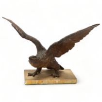 19th century patinated bronze sculpture of an eagle with spread wings, unsigned, on coloured