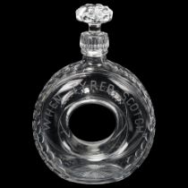 AUTOMOBILIA INTEREST - novelty glass Whisky decanter in the form of a tyre, inscribed "When tyred,