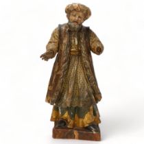An 18th Century Italian carved and painted wood figure of standing wise man, height 45cm 1 hand