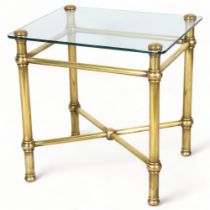 A 20th Century brass framed plant stand / side table with glass top, height 50cm, top 50 x 41cm Good