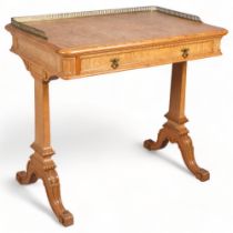 A Victorian Hungarian ash writing table, circa 1860, by Holland & Sons, brass galleried top with