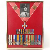 A framed group of 9 Great War and Second War Service medals, including Military Cross awarded to F L
