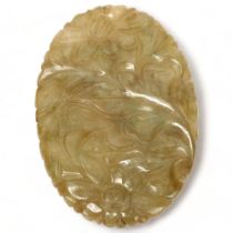 A small Chinese relief carved jade plaque, with floral decoration, 45mm x 30mm Perfect condition