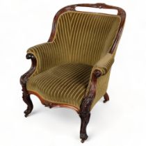 A Victorian rosewood-framed fireside chair Good condition with minor age-related flaws and