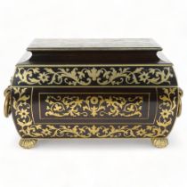 19th century ebony and brass inlaid rectangular box, with barrel sides, heavy gilt-brass ring