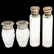 Pair of tall cut-glass jars with hallmarked silver tops, height 14cm, and a pair of smaller glass