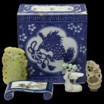 3 small jade carvings, largest 7.5cm, Chinese blue and white porcelain pillow, height 14cm, and a