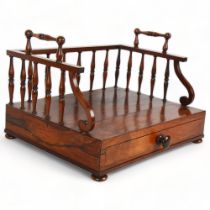 19th century rosewood desk top book rack, with spindled gallery and single drawer below, 33cm x 27cm