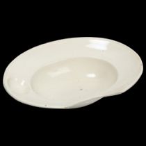 Longwy white glaze pottery barber's bowl, length 30cm Good condition with a couple of very tiny