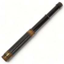 A small Victorian brass and leather 2-draw field telescope, in leather case Brass tarnished