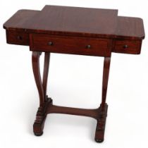A 19th century mahogany writing desk with cantilever rising top, 3 frieze drawers on lyre-shaped end