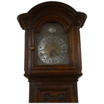 A Swiss 18th century tall oak 30-hour longcase clock, brass and silvered dial dated 1781 with