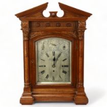 Impressive Victorian architectural oak-cased 8-day bracket clock, by Georg Oram of London, carved