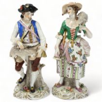 Pair of Sitzendorf porcelain shepherd and shepherdess figures, height 20cm The lady's arm and